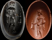 A roman onyx intaglio. Mercury. The god is turned to the right, holding the caduceus in his right hand and a bag with coins in the left one. Ground li...