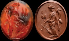 A roman carnelian intaglio. Tyche-Demetra. The standing goddess, draped, is turned three quarters to the right. She holds the cornucopia against her r...
