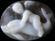 A roman double-layer agate intaglio. Cupid on a dolphin. The winged putto is riding the sea creature, grabbing its back and holding the reins. The dol...