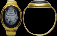 A rare, roman nicolo intaglio, mounted in an ancient gold ring. Menorah. The seven-armed chandelier ends with a three-edged base (the tripode base typ...