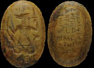 A roman magic yellow jasper intaglio. Rare depiction of anguipes Anubis wearing military clothing, surrounded by magic inscriptions. In this case we a...