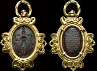 A rare, magic hematite intaglio, mounted in a gold pendant at a later time. Horus-Harpocrates (front); magic inscriptions (back and border). The god, ...