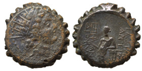 SELEUKID KINGS of SYRIA. Antiochos VI Dionysos, 144-142 BC. Ae serrate (bronze, 7.66 g, 20 mm), Ake-Ptolemais. Radiate and diademed head of Antiochos ...