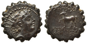 SELEUKID KINGS of SYRIA. Antiochos VI Dionysos. 144-142 BC. Ae Serrate (bronze, 3.55 g, 15 mm). Ptolemaïs (Ake) mint (?). Radiate and diademed head ri...