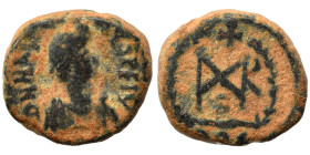 Marcian, 450-457. Nummus (bronze, 1.48 g, 11 mm), Constantinople. D N MARCIANVS P F AV Diademed, draped and cuirassed bust right. Rev. Monogram in wre...