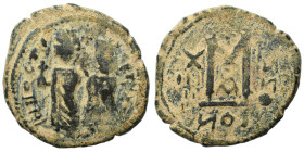 Persian Occupation of Syria, 610-630. Phocas, with Leontia type. Follis (bronze, 12.60 g, 30 mm), uncertain mint in Syria. Phocas standing facing, hol...