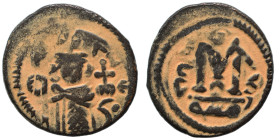 Arab Byzantine. Umayyad Caliphate, circa AD 641-660. Fals (bronze, 3.19 g, 19 mm), Dimashq (Damascus). Pseudo-Byzantine type, imitating the types of C...