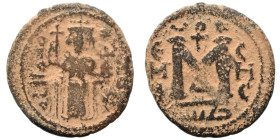 Arab Byzantine. Umayyad Caliphate. temp. Mu'awiya I ibn Abi Sufyan, AH 41-60 / 661-680 AD. Fals (bronze, 3.95 g, 20 mm), Hims. Imperial figure standin...
