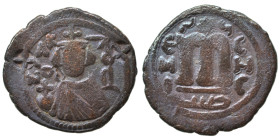 Arab Byzantine. Umayyad Caliphate. temp. Mu'awiya I ibn Abi Sufyan, AH 41-60 / 661-680 AD. Fals (bronze, 3.78 g, 21 mm), Hims. Imperial figure standin...