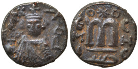Arab Byzantine. Umayyad Caliphate. temp. Mu'awiya I ibn Abi Sufyan, AH 41-60 / 661-680 AD. Fals (bronze, 3.66 g, 17 mm), Hims. Imperial figure standin...
