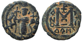 Arab-Byzantine. Fals (bronze, 3.11 g, 19 mm). Imperial standing figure type. Dimashq (Damascus) mint. Struck circa 670-680 or later. Standing imperial...