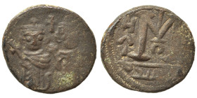 Arab Byzantine. Umayyad Caliphate. Abd al-Malik ibn Marwan, circa 685-690. Fals (bronze, 3.69 g, 17 mm), Baalbek (Heliopolis). Two imperial standing f...