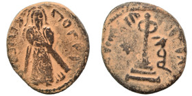 Arab Byzantine. Umayyad Caliphate. al-Malik ibn Marwan, AH 65-86 / 685-705 AD. Fals (bronze, 2.35 g, 18 mm), 'Standing Caliph' type. Caliph standing f...