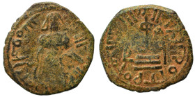Arab Byzantine. Umayyad Caliphate. al-Malik ibn Marwan, AH 65-86 / 685-705 AD. Fals (bronze, 1.79 g, 19 mm), 'Standing Caliph' type. Caliph standing f...