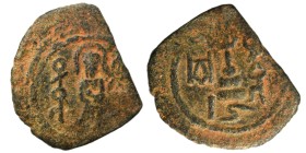 Arab Byzantine. Umayyad Caliphate. al-Malik ibn Marwan, AH 65-86 / 685-705 AD. Fals (bronze, 2.47 g, 21 mm), 'Standing Caliph' type. Caliph standing f...