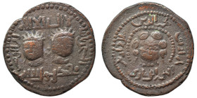 Anatolia & al-Jazira (Post-Seljuk). Artuqids (Mardin). Najm al-Din Alpi, AH 547-572 / AD 1152-1176. Dirham (bronze, 11.96 g, 31 mm). Two diademed male...