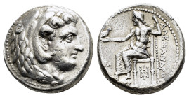 KINGS of MACEDON. Alexander III The Great.(336-323). Babylon.Tetradrachm. 

Obv : Head of Herakles right, wearing lion skin.

Rev : AΛΕΞΑΝΔΡΟΥ.
Zeus A...