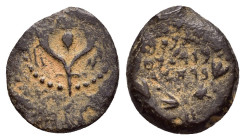 JUDAEA. Hasmoneans. John Hyrkanos II.(67/3-40 BC).Jerusalem.Ae.

Obv : Splayed double cornucopia with pomegranate between the horns.

Rev : Legend in ...