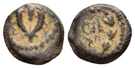 JUDAEA. Hasmoneans. John Hyrkanos II.(67/3-40 BC).Jerusalem.Ae.

Obv : Splayed double cornucopia with pomegranate between the horns.

Rev : Legend in ...