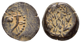 JUDAEA. Hasmoneans. John Hyrkanos II.(67/3-40 BC).Jerusalem.Ae.

Obv : Splayed double cornucopia with pomegranate between the horns.

Rev : Legend in ...