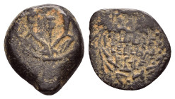 JUDAEA. Hasmoneans. John Hyrkanos II.(67/3-40 BC).Jerusalem.Ae.

Obv : Splayed double cornucopia with pomegranate between the horns.

Rev : Legend in ...