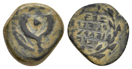 JUDAEA. Hasmoneans. John Hyrkanos II.(67/3-40 BC).Jerusalem.Ae.

Obv : Splayed double cornucopia with pomegranate between the horns.

Rev : Legend in ...