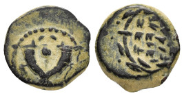 JUDAEA. Hasmoneans. John Hyrkanos II.(67/3-40 BC).Jerusalem.Ae.

Obv : Splayed double cornucopia with pomegranate between the horns.

Rev : Legend in ...