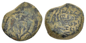 JUDAEA. Hasmoneans. John Hyrkanos II.(67/3-40 BC).Jerusalem.Ae.

Obv : Splayed double cornucopia with pomegranate between the horns.

Rev : Legend in ...
