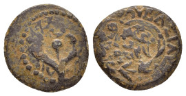 JUDAEA. Hasmoneans. John Hyrkanos II.(67/3-40 BC).Jerusalem.Ae.

Obv : Splayed double cornucopia with pomegranate between the horns.

Rev : Legend in ...