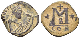 ANASTASIUS I (491-518). Follis. Constantinople.

Obv : D N ANASTASIVS P P AVG. Diademed, draped and cuirassed bust right.

Rev : Large M; star to left...