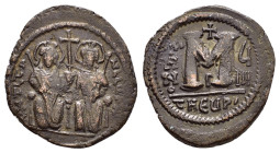 JUSTIN II (565-578). Follis. Antioch. 

Obv : D N IVSTINOS ΔIΔ Ν.
Justin and Sophia seated facing on double throne, holding globus cruciger and each h...