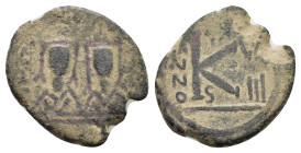 JUSTIN II (565-578).Carthage.Follis. 

Condition : Good very fine.

Weight : 7.81 gr
Diameter : 24 mm
