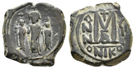 HERACLIUS with MARTINA and HERACLIUS CONSTANTINE (610-641).Nicomedia. Follis. 

Obv : Heraclius, in centre, flanked by Martina, on left, and Heraclius...