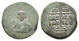 ANONYMOUS FOLLIS.Romanus III.(1028-1034).Constantinople.Follis.

Obv : + ЄMMANOVH IC - XC.
Facing bust of Christ Pantokrator.

Rev : + IS XS ЬASILЄ ЬA...
