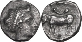 Greek Italy. Central and Southern Campania, Nola. AR Nomos, c. 400-385 BC. Obv. Diademed head of nymph right. Rev. Man-headed bull walking left; above...