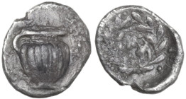 Greek Italy. Southern Apulia, Tarentum. AR Hemiobol, 450-380 BC. Obv. Jug. Rev. Wreath. HN Italy 867; HGC 1 867. AR. 0.30 g. 7.75 mm. VF.