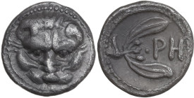 Greek Italy. Bruttium, Rhegion. AR Litra, c. 420-415/410 BC. Obv. Lion-mask. Rev. PH within two-leaved olive spray. HN Italy 2495; SNG ANS 670/674. AR...
