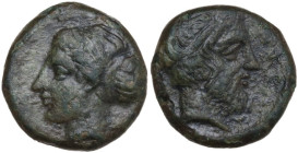 Sicily. Entella. AE 15 mm, before 404 BC. Obv. Female head left, hair in ampyx and sphendone. Rev. Bearded male head right, wearing hairband. CNS I 1....