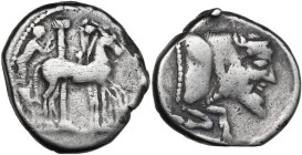 Sicily. Gela. AR Tetradrachm, c. 465-450 BC. Obv. Charioteer driving slow quadriga right; Ionic column behind; [grain ear in exergue]. Rev. CΕΛΑΣ. For...