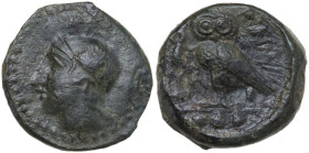Sicily. Kamarina. AE Tetras, 425-405 BC. Obv. Head of Athena left, wearing helmet decorated with wing. Rev. Owl standing left, head facing, wings clos...