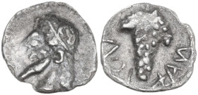 Sicily. Naxos. AR Litra, 530-510 BC. Obv. Head of Dionysos left, wearing wreath of ivy. Rev. Bunch of grapes. HGC 2 967. AR. 0.57 g. 11.00 mm. Pleasan...