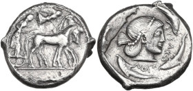 Sicily. Syracuse. Gelon I (485-478 BC). AR Tetradrachm. Obv. Charioteer driving slow quadriga right; above, Nike flying right and crowning horses. Rev...