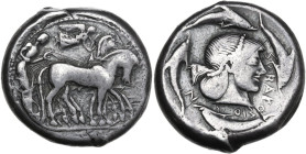 Sicily. Syracuse. Gelon I (485-478 BC). AR Tetradrachm. Obv. Charioteer driving slow quadriga right; above, Nike flying right and crowning horses. Rev...
