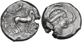 Sicily. Syracuse. Second Democracy (466-405 BC). AR Tetradrachm, c. 430 BC. Obv. Charioteer driving slow biga right; above, Nike flying right, crownin...