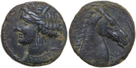 Punic Sardinia. AE 18 mm, c. 300-260 BC. Obv. Head of Tanit left, wearing wreath of grain. Rev. Horse head right, sun to right. Lulliri pl. 8, 195. AE...