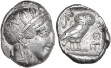 Continental Greece. Attica, Athens. AR Tetradrachm, c. 454-404 BC. Obv. Head of Athena right, with frontal eye, wearing earring, necklace, and crested...
