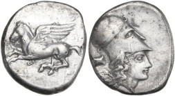 Continental Greece. Corinthia, Corinth (?). AR Stater. Obv. Pegasus flying left. Rev. Head of Athena right, wearing Corinthian helmet without neckguar...