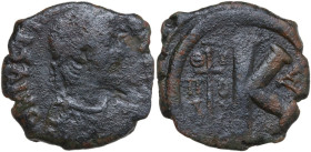 Justinian I (527-565). AE Half Follis. Theupolis (Antioch) mint, 1st officina. Obv. DN IVSTINIANVS PP AVS. Draped and diademed bust right. Rev. Large ...