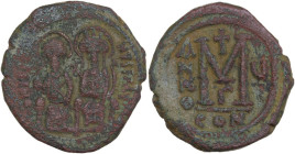 Justin II (565-578). AE Follis, Constantinople mint. Obv. DN IVSTINVS PP AVG. Justin and Sophia seated facing; between their heads, cross. Rev. Large ...