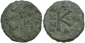 Heraclius (610-641) with Heraclius Constantine. AE Half follis, Ravenna mint, dated RY 21 (630-631). Obv. Heraclius standing front in military attire,...